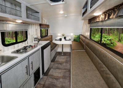 Interior of Rove Lite Ultra Lite Trailer View of Couch and Table